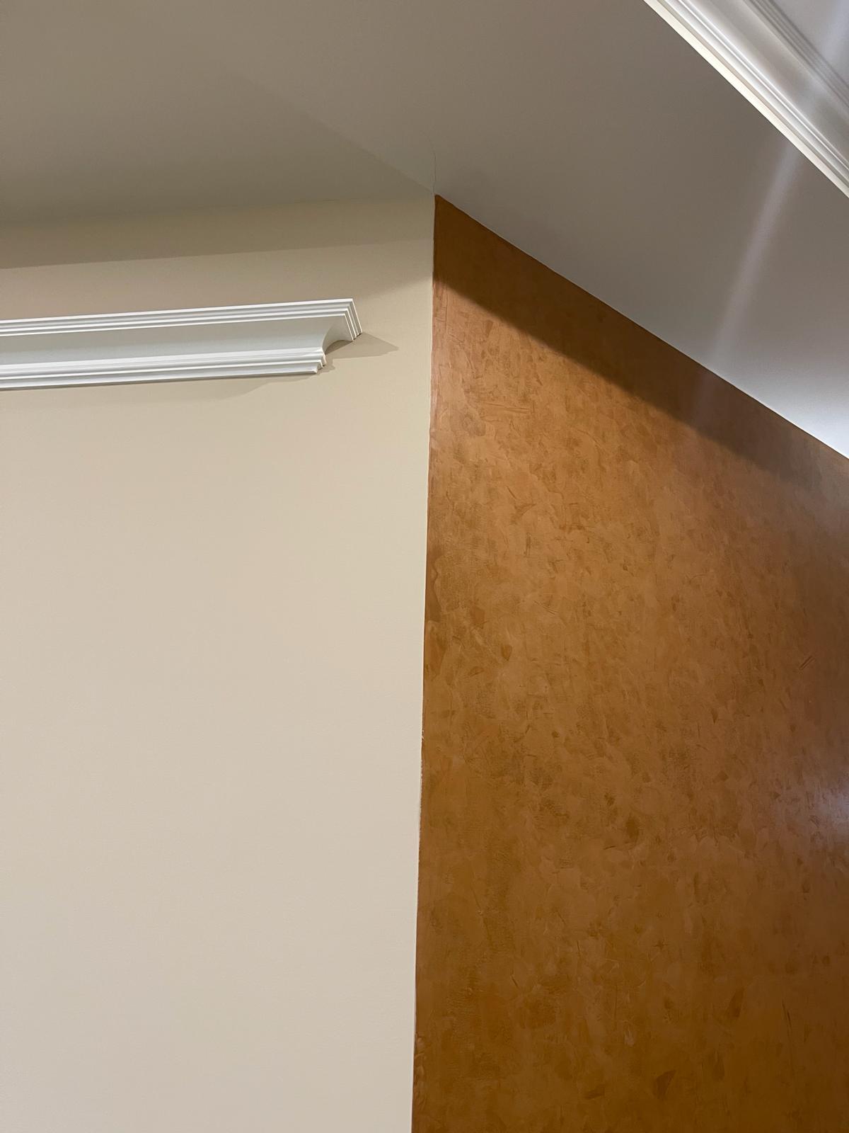 A finished wall under raking light by M and M Dry Wall in Jonesville